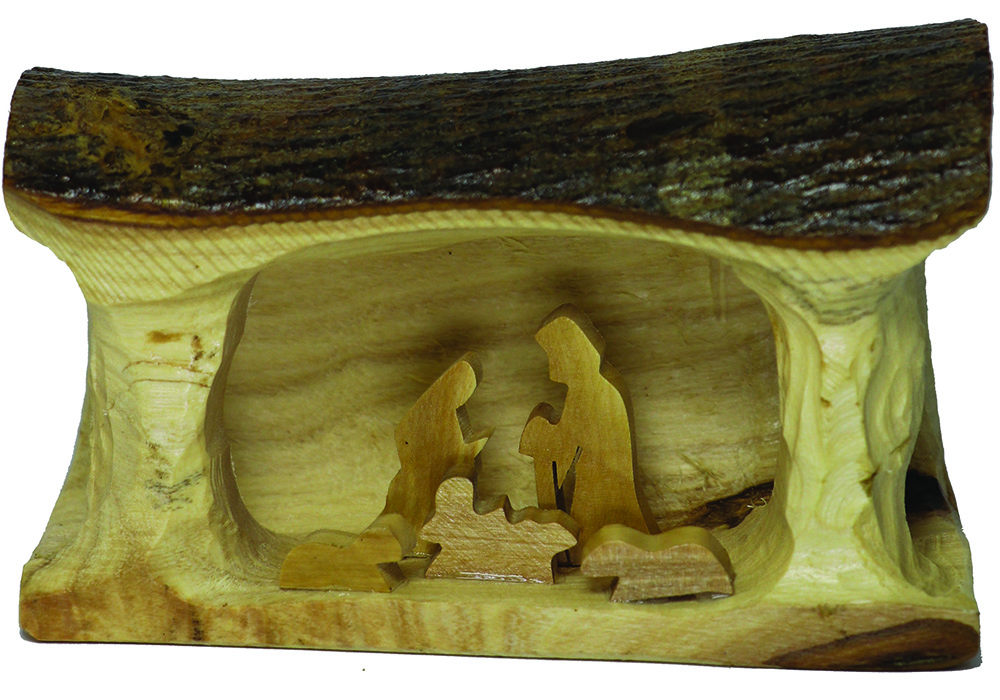 E05 – Small Grotto Carved in Branch